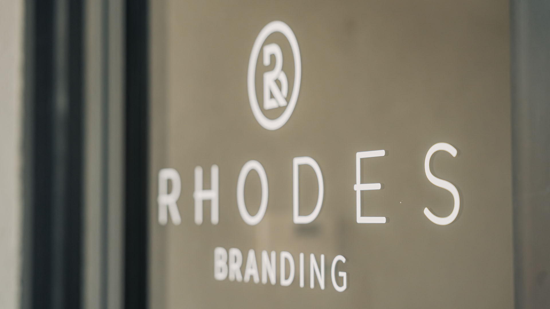 Rhodes Branding office door